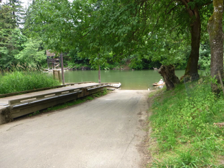 Hard surface driveway to boat launch area – dock – wood ramp with small lip on the side – Tualatin River